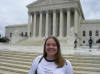 Carrie smiling in front of Supreme Court Building 2
